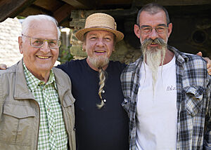 Toni Rasser, Daniel Amrein und Werner Kast lächeln in die Kamera (v.l.n.r.).