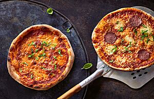 Die knusprig gebackene Pizza, egal ob als Margaritha oder mit weiteren Belägen, lädt nur so zum Reinbeißen ein.