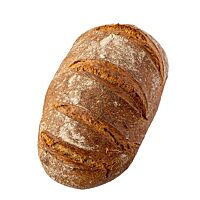 Das längliche Dinkelbrot mit Hafer ist kräftig ausgebacken und auf der Oberfläche mehrfach parallel eingeschnitten.